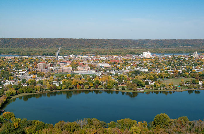 Aerial view of the Mississippi River with the city of Winona in the distance.